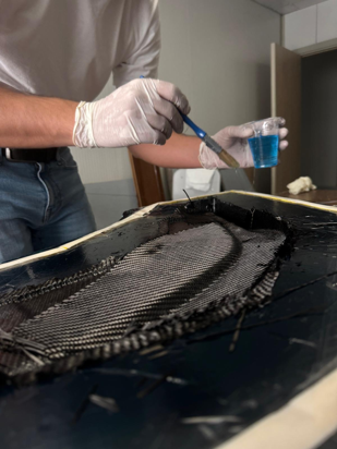 Carbon fiber body manufacturing